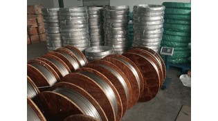 What is a suitable material for the coiled tubing?  What is a suitable material for the coiled tubing?